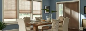 Honeycomb shades in a dining room window