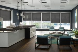 Solar shades in a room with large windows